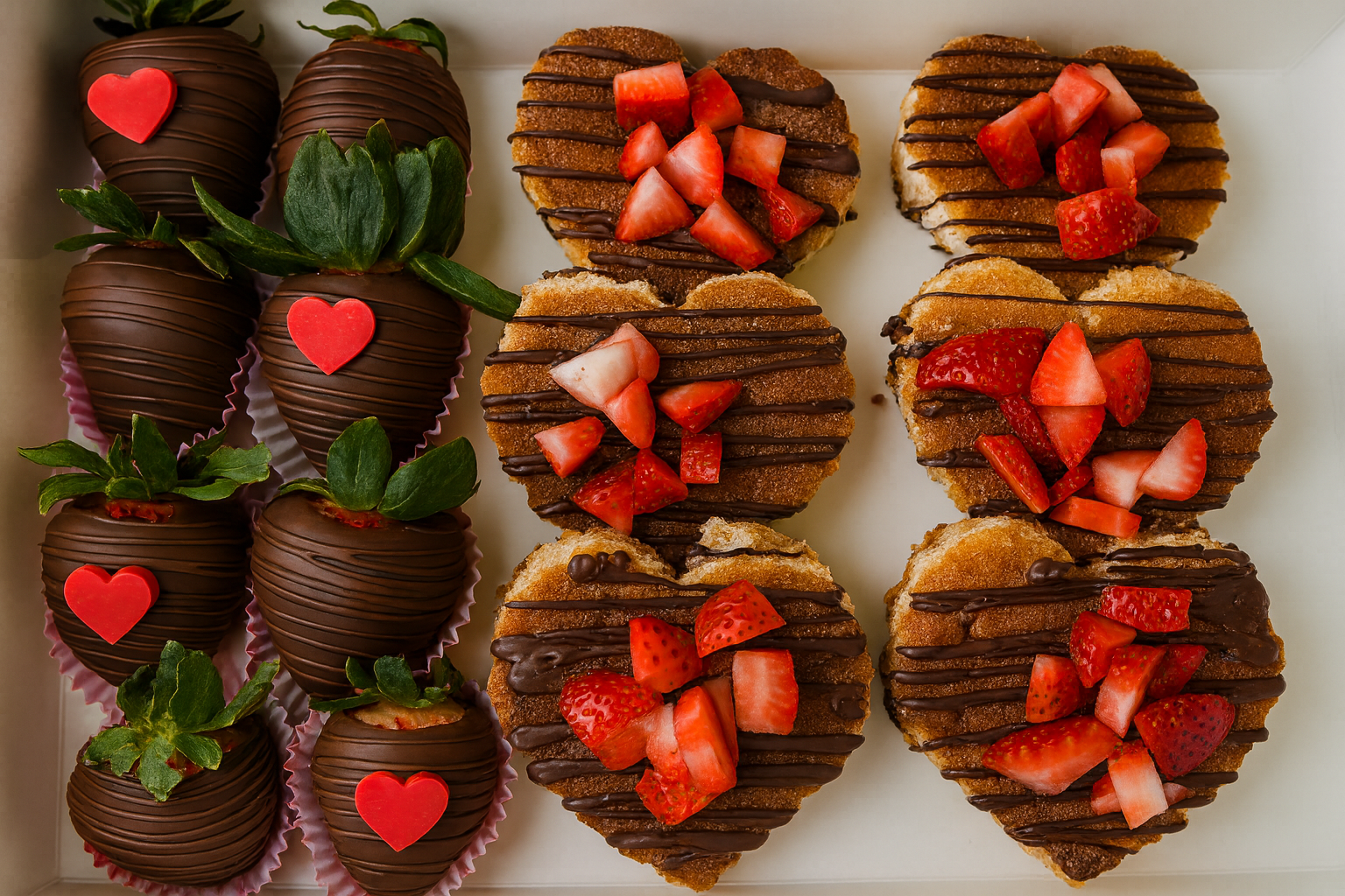 Strawberries and churro cheesecake deserts